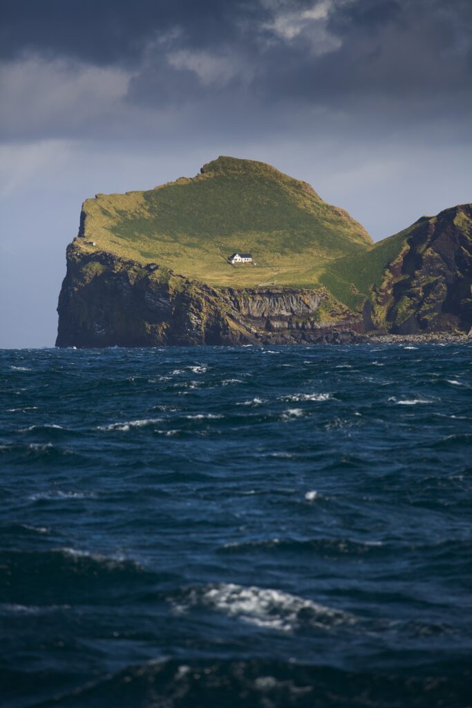 A small house in the middle of a mighty landscape, Iceland. Photo by Mats Grimsæth.